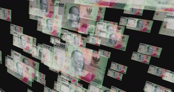 Indonesia Rupiah 20000 banknote – flying between transparent money ...