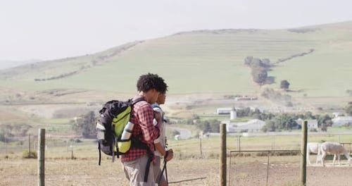 Couple Hiking in Rural Landscape Together