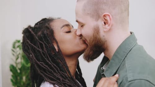 Loving Couple Kissing Indoors, Close Up