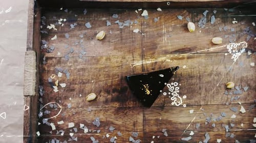 Dessert Slice with Pistachios on a Wood Tray