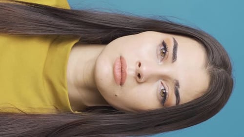 Woman Posing Pretty with Neutral Makeup