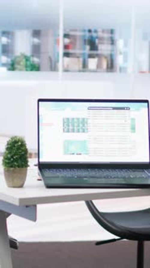 Vertical Video Notebook in Workspace with Forex Trading Indexes Displayed