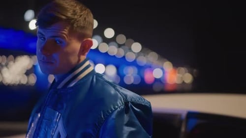 Evening Urban Atmosphere Filled with Quiet Anticipation and Street Illumination Peaceful Male Figure