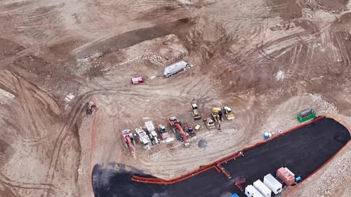 There is Road Equipment on the Construction Site Top View Drone Overhead Shot