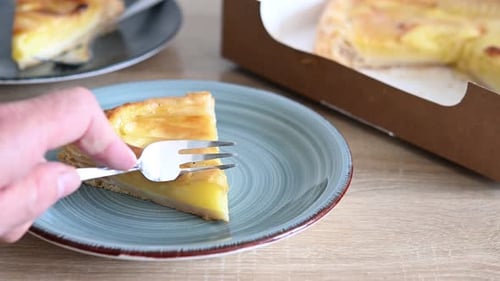 Taking a bite of apple pie with a fork