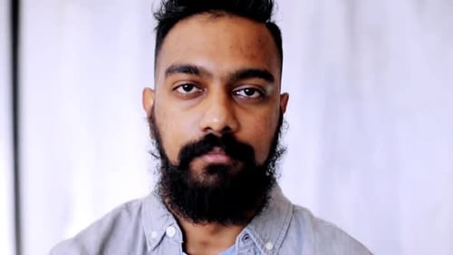 Bearded Man Smiling Happily at the Camera
