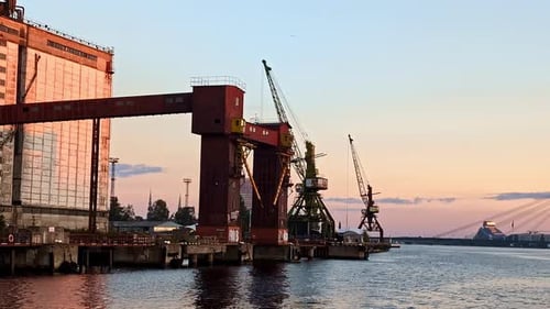 A Sunset View of the Port of Riga in Latvia - Aerial Drone Shot