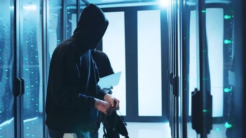 Hackers Breaking Into a Brightly Lit Server Room