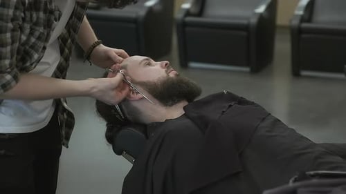 Barber Cuts Hair in Workplace