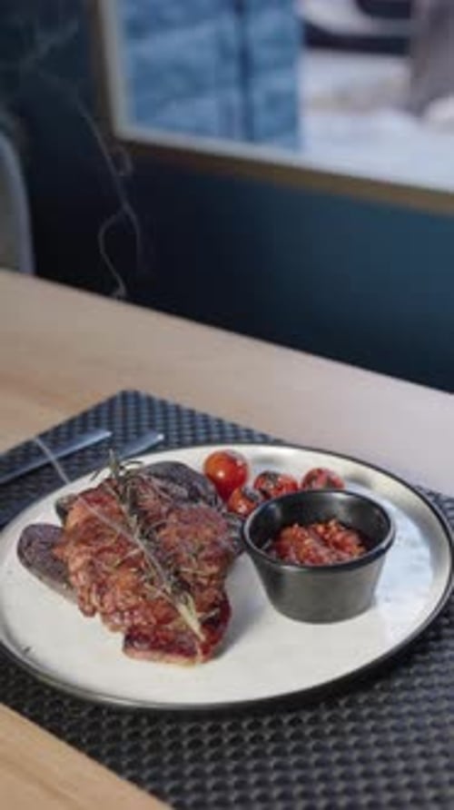 Steaming Grilled Steak Plate with Vegetables