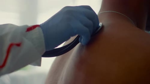 Physician Listening Patient Back In Ward Closeup. Health Checkup Infectious Unit. Unrecognized Ph...