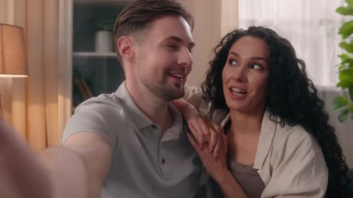 Smiling Couple Record Video Inside Living Room