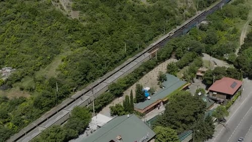 Freight Wagons Moving On The Railway Delivering Goods In Mtskheta-Mtianeti, Georgia. aerial