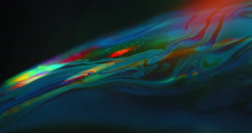 Macro Iridescent Surface Tension With Fluid Rainbow Patterns