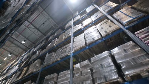 Big Factory Warehouse. Store Aisles. Camera Travels Inside a Large Store. Warehouse