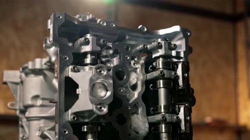 Close Up The Crankshaft Set of Pistons Closeup on Desktop of an Auto Mechanic Spare Parts of the Car