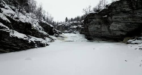 Epic Winter Expedition Through a Frozen River Gorge and Canyon