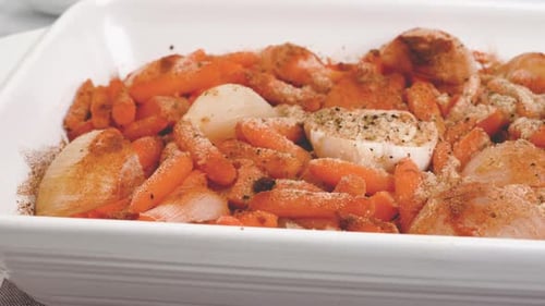Fresh Carrots and Onions in Baking Dish
