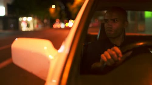 Man driving at night bokeh background, Wide