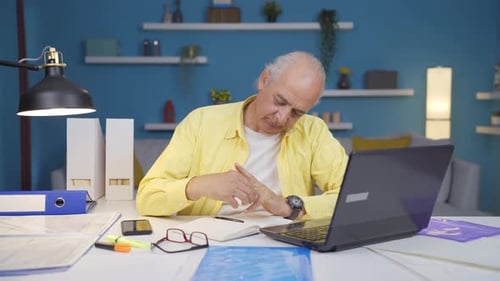 Home office worker old man thinking about private life problems.