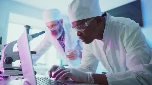 Scientists Analyzing Samples in Modern Laboratory