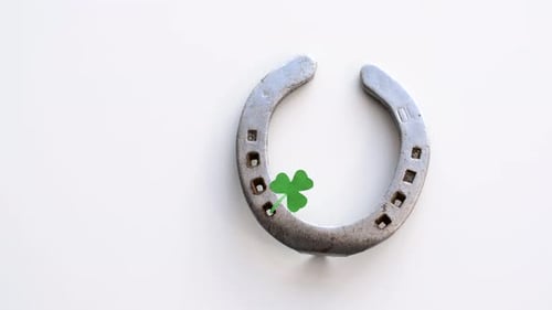 Holidays and St Patrick'S Day Concept - Horseshoe with Shamrock on White
