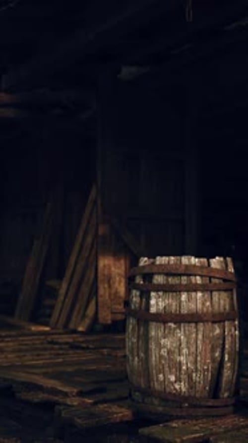 A Barrel on a Wooden Platform in Front of a Building