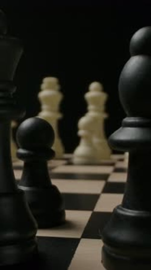 Chess Pieces Arranged on Chessboard, Close Up Studio