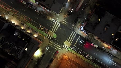 Aerial time lapse of traffic on a city street in Brooklyn.