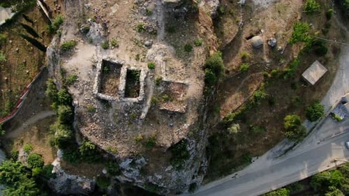 Aerial headshot video of the big stones on a sunny day. High angle view of the old town district. pa