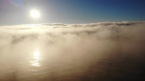 Clouds Fog Over Sea In The Morning. Aerial View