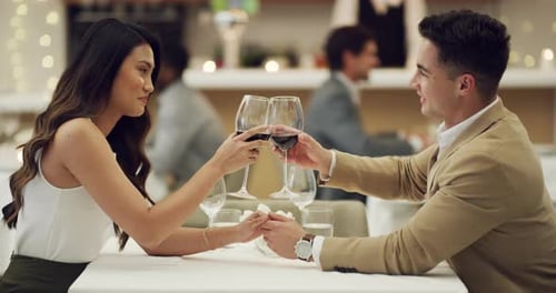 4k video footage of a happy young couple having a romantic date at a fancy restaurant