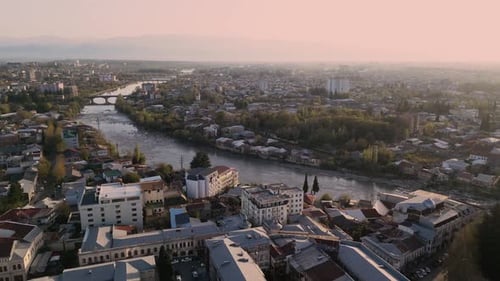 Drone Above Small Town With River