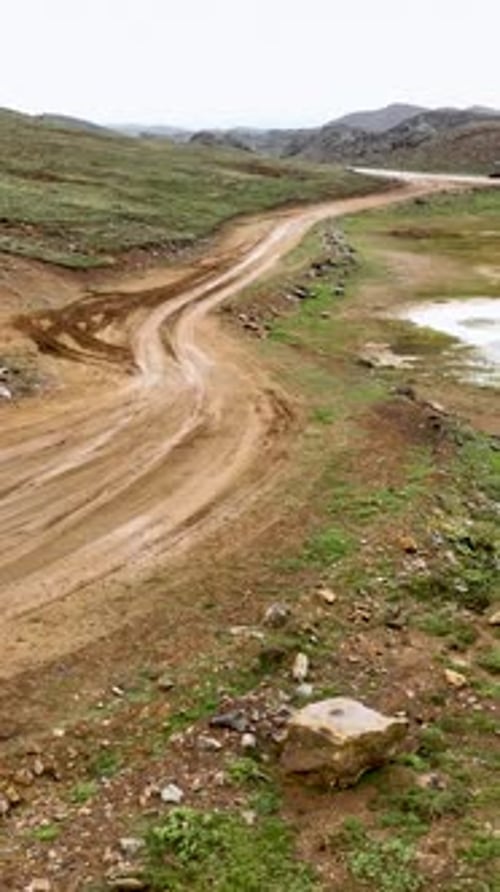 Vertical Video Mountain Expedition to a MartianLike Landscape Uncover the Beauty From a Car's