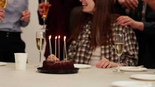 Young Woman Celebrating Birthday with Friends at Work