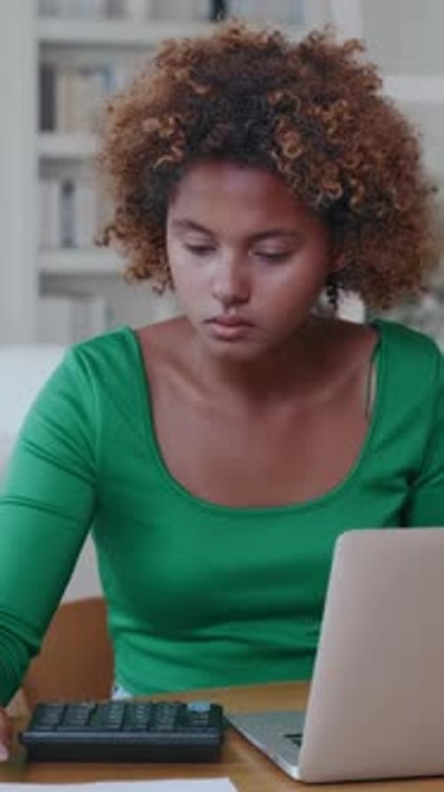 Focused Student Engaged in Research and Study in Cozy Workspace