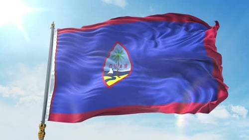 Guam Flag Waving in Realistic Fabric Against Sunny Blue Sky