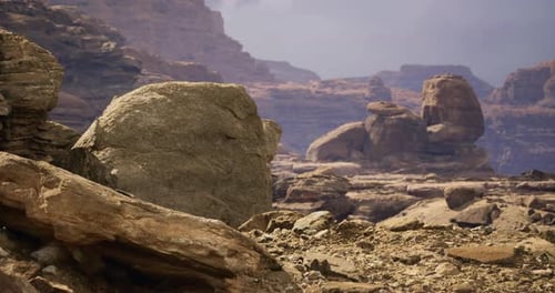 Rock Formations in a Rugged Desert Landscape Under Soft Sunlight