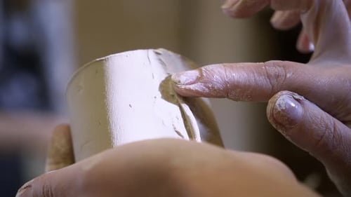 A Close Up Showcasing the Intricate Craftsmanship of Pottery and Clay Shaping Techniques Stock Clip
