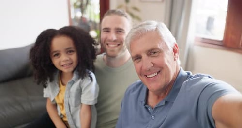 Three Family Members Smiling Together Indoors