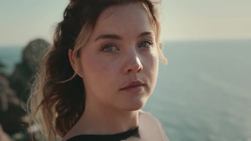CloseUp Portrait of a Young Woman By the Sea