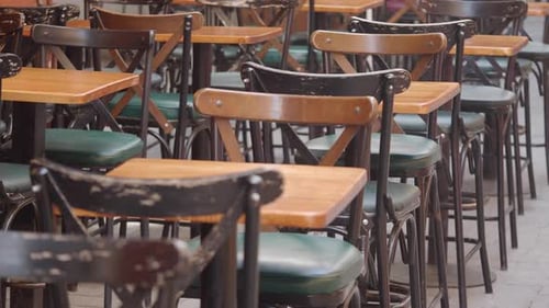 Empty Cafe Tables Set for Customers in the Afternoon