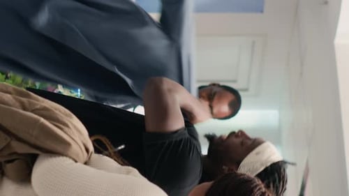 Vertical Video Man in Fashion Boutique Tries on Clothes