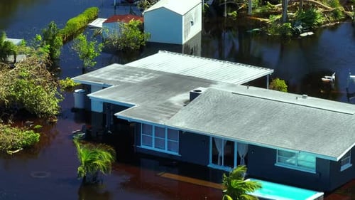 Surrounded By Hurricane Ian Rainfall Flood Waters Home in Florida Residential Area Consequences of