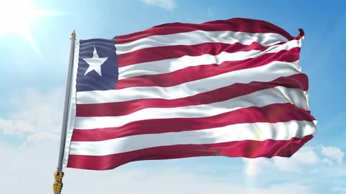 Liberian National Flag Waving Against a Blue Sky