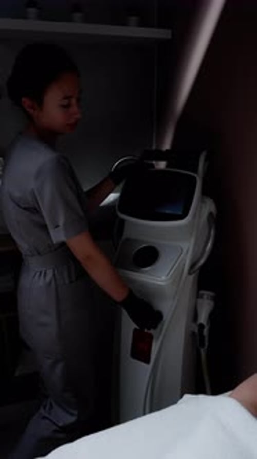 Aesthetician Operating Skincare Machinery