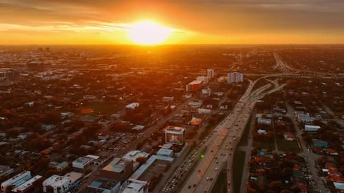 Amazing golden hour above the metropolis. Splendid top view of Miami panorama at sunset time.