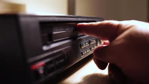 Playing VHS Video Tape, Inserting and Pressing Play Button, Close Up