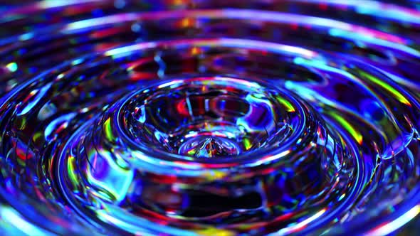 Colorful Liquid Ripples Radiating From Central Peak Generating ...