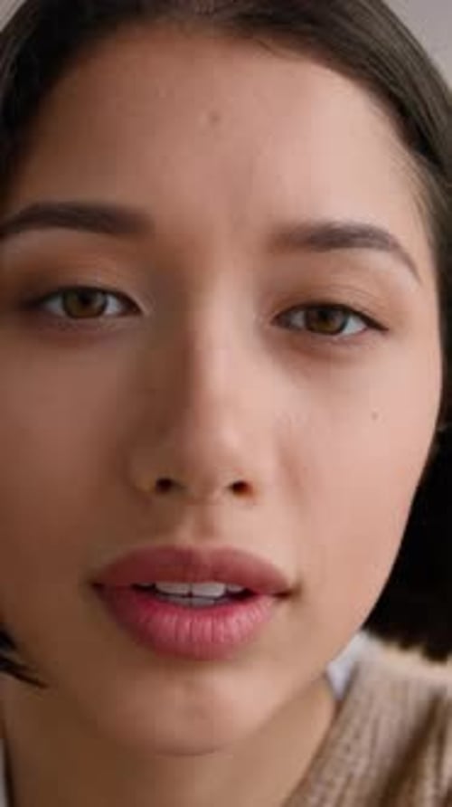 POV Webcam Smiling Hispanic Woman Zooming Touchscreen Photo Mobile Phone at Home Point of View